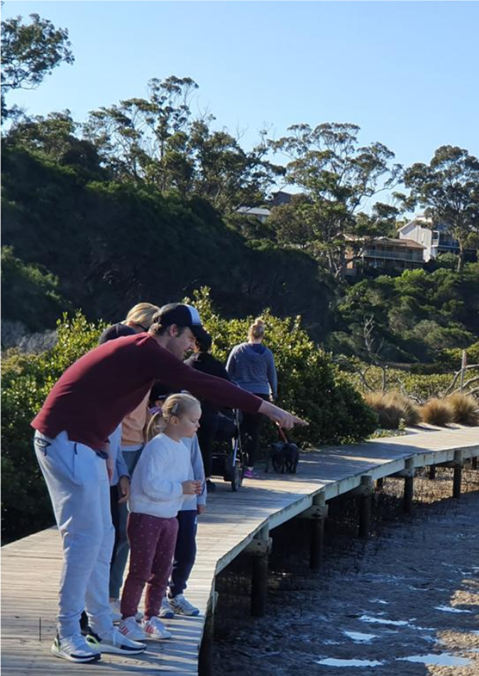 A group of people on a dock

AI-generated content may be incorrect.