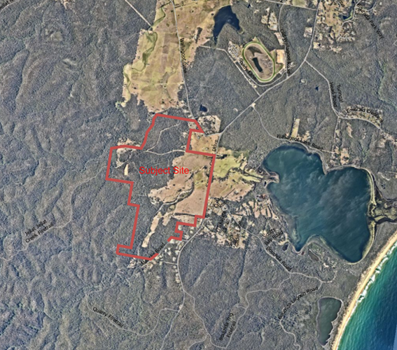 An aerial view of land with land and water

AI-generated content may be incorrect.